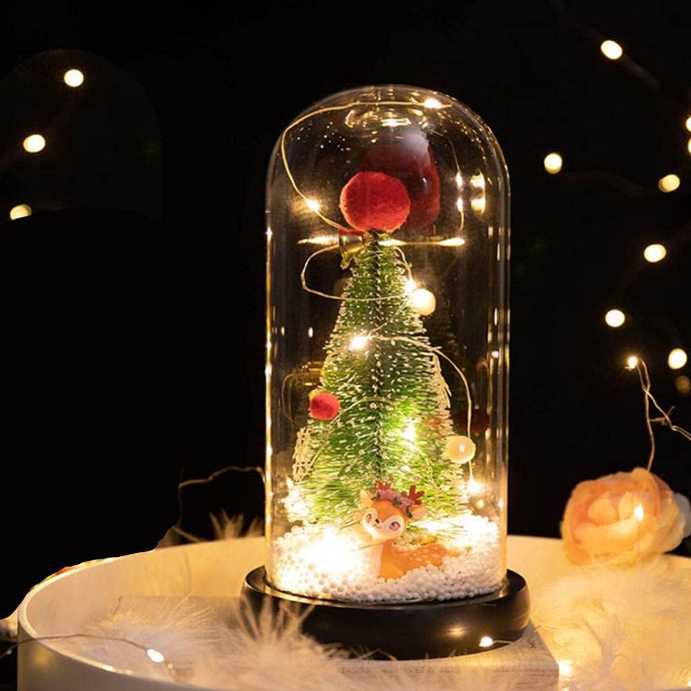 Albero di natale in cupola di vetro con decorazione a led